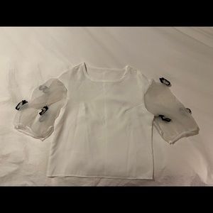 white top with butterflies details